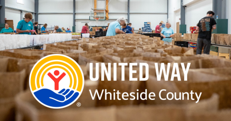 Volunteers helping bag food at United Way Whiteside County