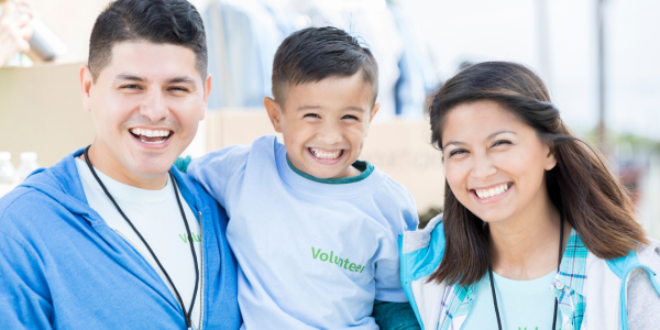 happy family of volunteers