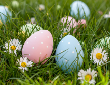Easter Egg Hunt Planning - image of colorful Easter eggs in a field